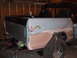 1979 Ford Bronco - This 1978 Ford Bronco is in a garage, undergoing repairs and bodywork on its rear quarter panel.