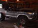 1979 Ford Bronco - This lifted Ford Bronco features custom skull graphics along its two-tone paint job.