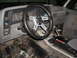 1992 Ford Ranger - The interior of a 1992 Ford Ranger shows an aftermarket steering wheel and a floor shifter.