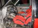 1992 Ford Ranger - Interior view of a 1992 Ford Ranger, showing custom red racing seats and steering wheel.