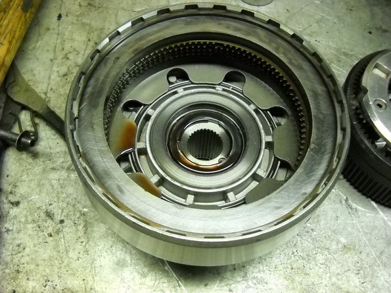 Close-up of an automatic transmission component, possibly a torque converter clutch drum