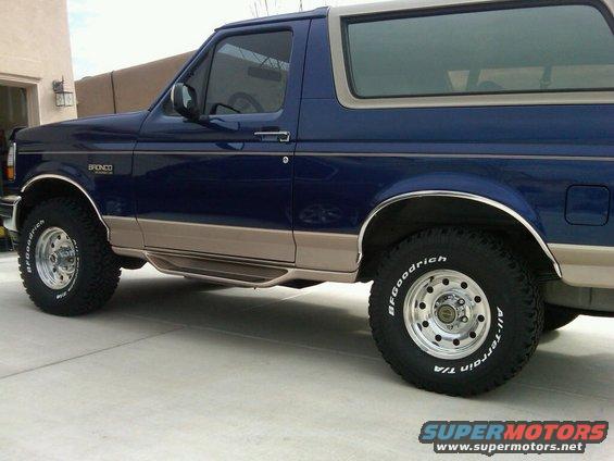Blue and tan 1996 Ford Bronco side view with BFGoodrich tires