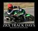 2001 Kawasaki KZ1000-A1 - Motorcycle rider on a green sportbike during a track day event.