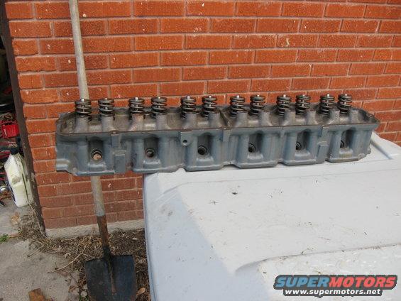 Engine cylinder head with valve springs visible