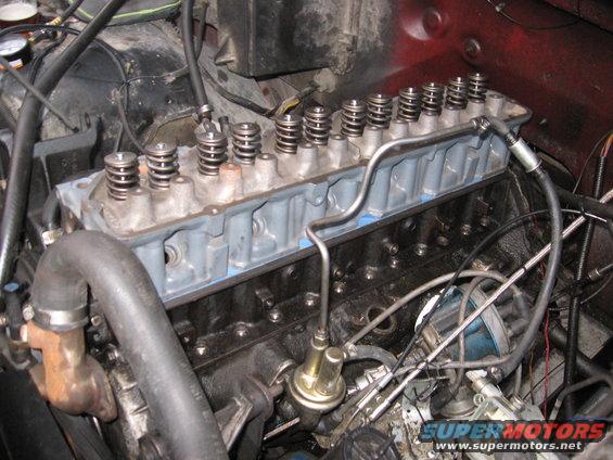 close-up of an engine's cylinder head with valve springs visible