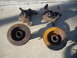 1992 Ford Ranger - Two front wheel knuckles and brake rotors are shown resting on a concrete surface.