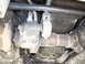 1994 Ford Explorer - Underside view of a vehicle's drivetrain components, including the differential and suspension.