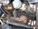 1994 Ford Explorer - Detail of engine wiring and exhaust manifold, with visible signs of wear and corrosion.
