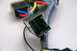 2003 Ford Taurus - Close-up view of a multi-pin electrical connector and associated wiring harness.