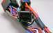 2003 Ford Taurus - Close-up of a multi-pin electrical connector with various colored wires.