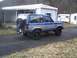 1985 Ford Bronco II - This 1985 Ford Bronco II is seen in a driveway with a house in the background.