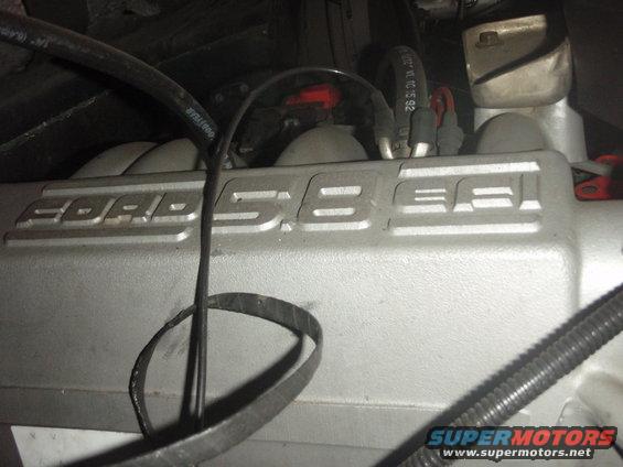 Ford 5.8L engine valve cover with hoses