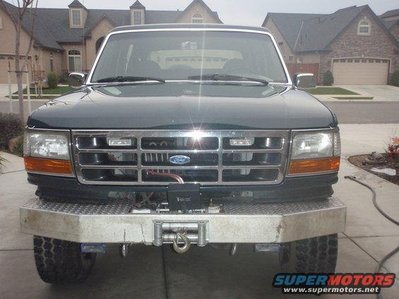1993 Ford Bronco front view with chrome grille and aftermarket bumper with winch