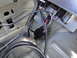 2003 Ford Taurus - Close-up view of a vehicle's wiring harness and connectors, showing various colored wires.