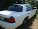 2002 Ford Crown Victoria - This 2002 Ford Crown Victoria features new window tinting, enhancing its classic sedan profile.