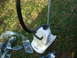 2002 Ford Crown Victoria - A Conair garment steamer sits on a grassy area, with some plastic wrap nearby.