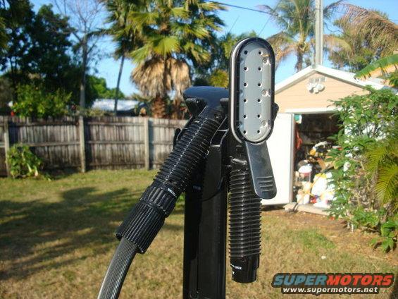 Steam cleaner part with ribbed handle and metal plate with holes