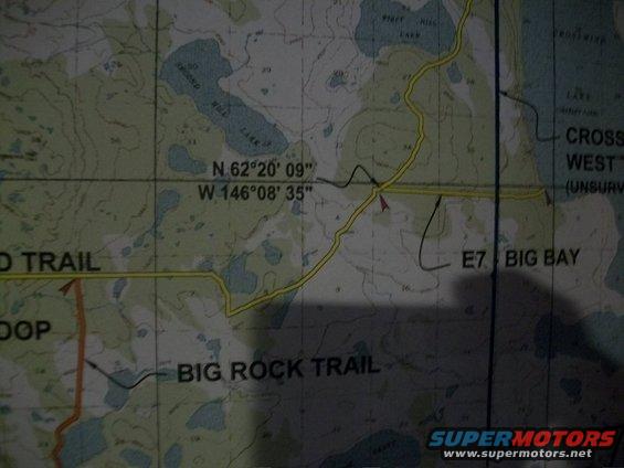 Topographic map showing trails and lakes with coordinates N 62°20'09" W 146°08'35"