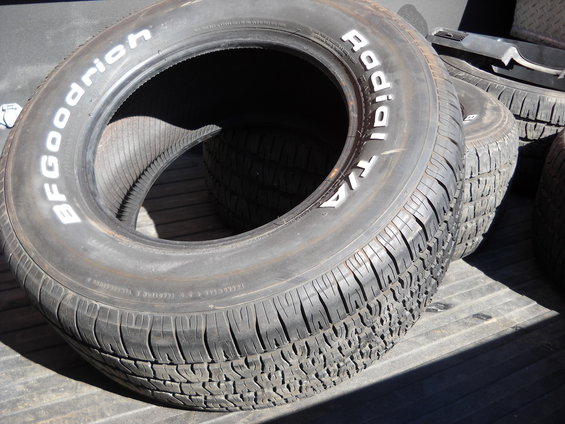 Stack of BFGoodrich Radial T/A tires in a truck bed