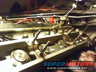 Exhaust cam removed, hold down kit installed.