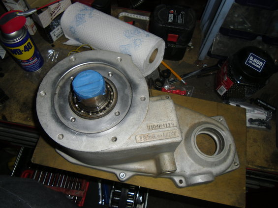Aluminum part with bearing and blue tape, part number 1104H4129