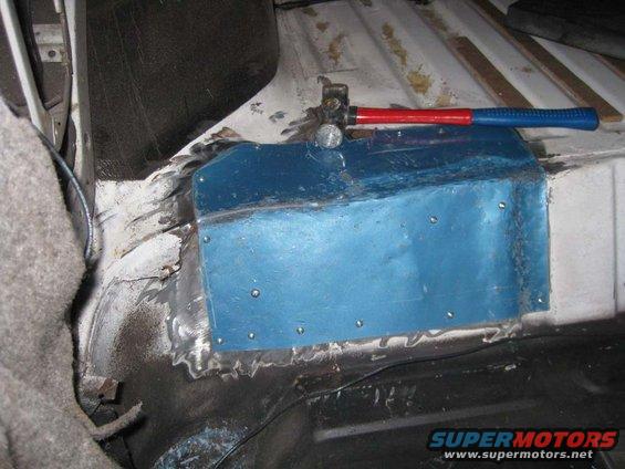 bronco-tub-wall-patches-001.jpg On both sides of the tub, just under the seat, I had that galvanic rust at the seam welds.  Sorry no picture of the rust.  After removing and cleaning the area, I made a patch panel from my old hood skin.  A little shaping with a body hammer and it fits like a glove.

Just a note:
When you remove large sections of sheet metal for replacement, KEEP the good portion of the sheet metal. It may come in handy someplace else on the truck.