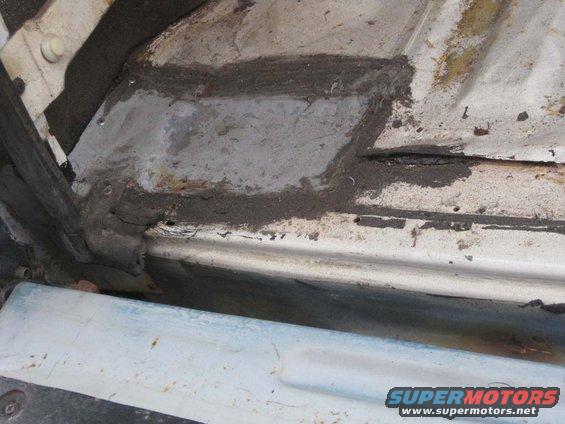 20099-body-work.jpg Now here is an older patch.  It was done about 5 years previous to this round of "Rust Busting"  to avoid the truth.  The truth being that there were serious rust problems under neath and along the tub support.  It didn't get any better :( .  You can see the seam just to the right of the patch that is swelled from rusting.