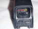 1991 Ford Bronco - This is a close-up view of a red dot sight, showing its internal display with colored bars.