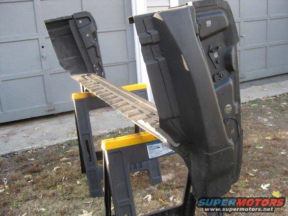 Black tailgate support on sawhorses