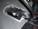 1993 Tracker Tournament - Close-up of a MotorGuide foot pedal installed in a recessed tray on a boat's floor.