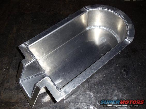 Aluminum footwell tray with visible welds and a textured surface