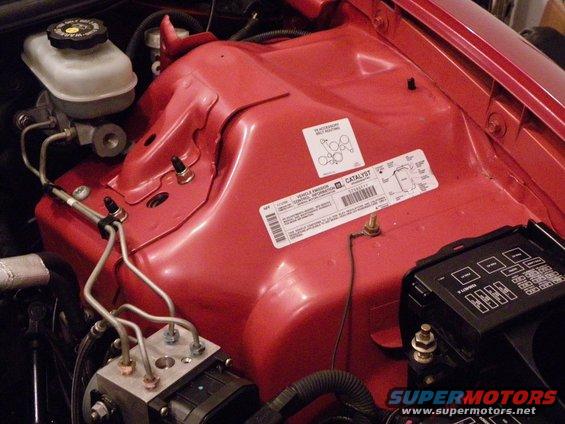 2001 Pontiac Trans Am engine bay, red painted metal, brake fluid reservoir, ABS module, fuse box
