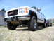1994 GMC Suburban - You may notice the oddly worn half bald tires. Front end was in DIRE need of rebuild: inner and outer tie rods, upper and lower balljoints,…