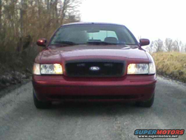 Red Ford Crown Victoria front grille and headlights
