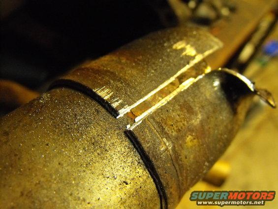 dscf1433.jpg I use the Sawzall to slice just through the old muffler stubs and save the tailpipe or front pipe (or cat pipe)