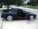 1994 Ford Probe - I had the car painted Hyundai Blue, but left the door, hood, and hatch wells red! Passenger side view.