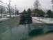 1979 Ford Bronco - A black 2009 Ford F-150 pickup truck is seen from behind on a snowy road.