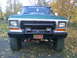 1979 Ford Bronco - Front view of a green Ford Bronco, likely a 1978 model, with custom accessories.