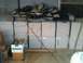 1989 Ford Bronco - A collection of outdated computer monitors and various boxes are stored together in an indoor space.