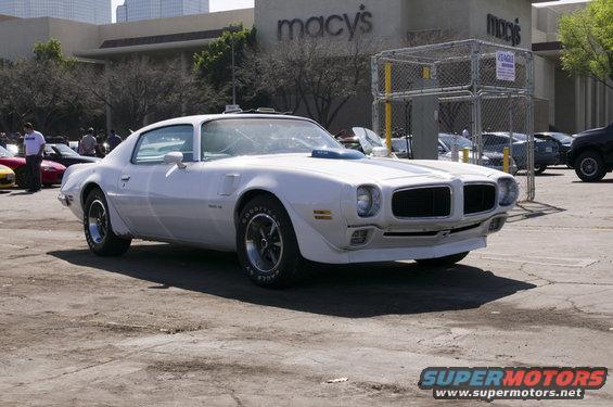White 1970 Pontiac Firebird parked in a lot