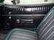1973 Ford Ranchero - Interior view of a 1973 Ford Ranchero, showing the door panel and seat upholstery.