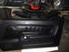 1973 Ford Ranchero - A black car door panel is shown with visible engine parts in the background.