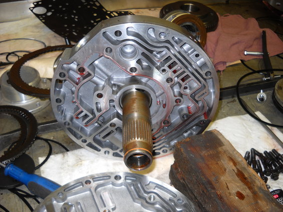 Disassembled transmission pump with internal channels visible