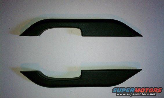 Two black plastic interior door pull handles