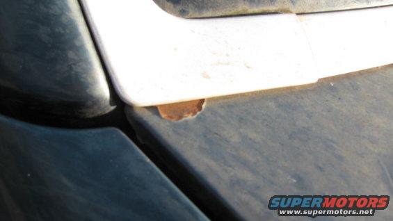 Passenger side by windshield