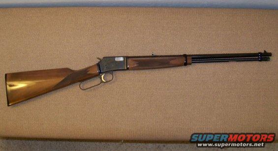 Lever-action rifle with wooden stock and metal receiver
