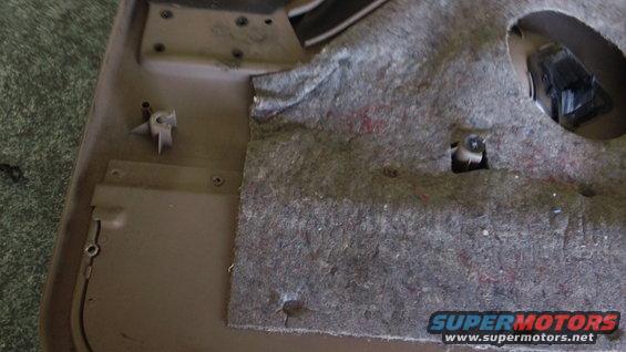 close-up of a car door panel with insulation