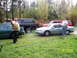 1978 Ford Bronco - Two men stand by vehicles in a grassy yard on a cloudy day. A date stamp shows 11/08/2009.