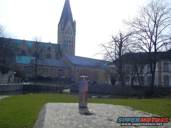 Lighter in foreground with a large cathedral in background