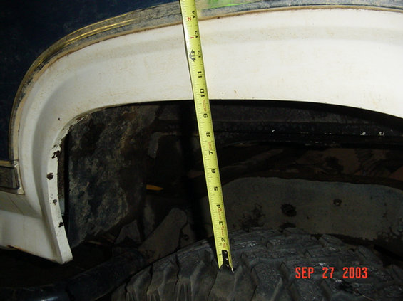 todds-sawzall-fun-004.jpg Measuring from the tires to the wheelwells for comparison later